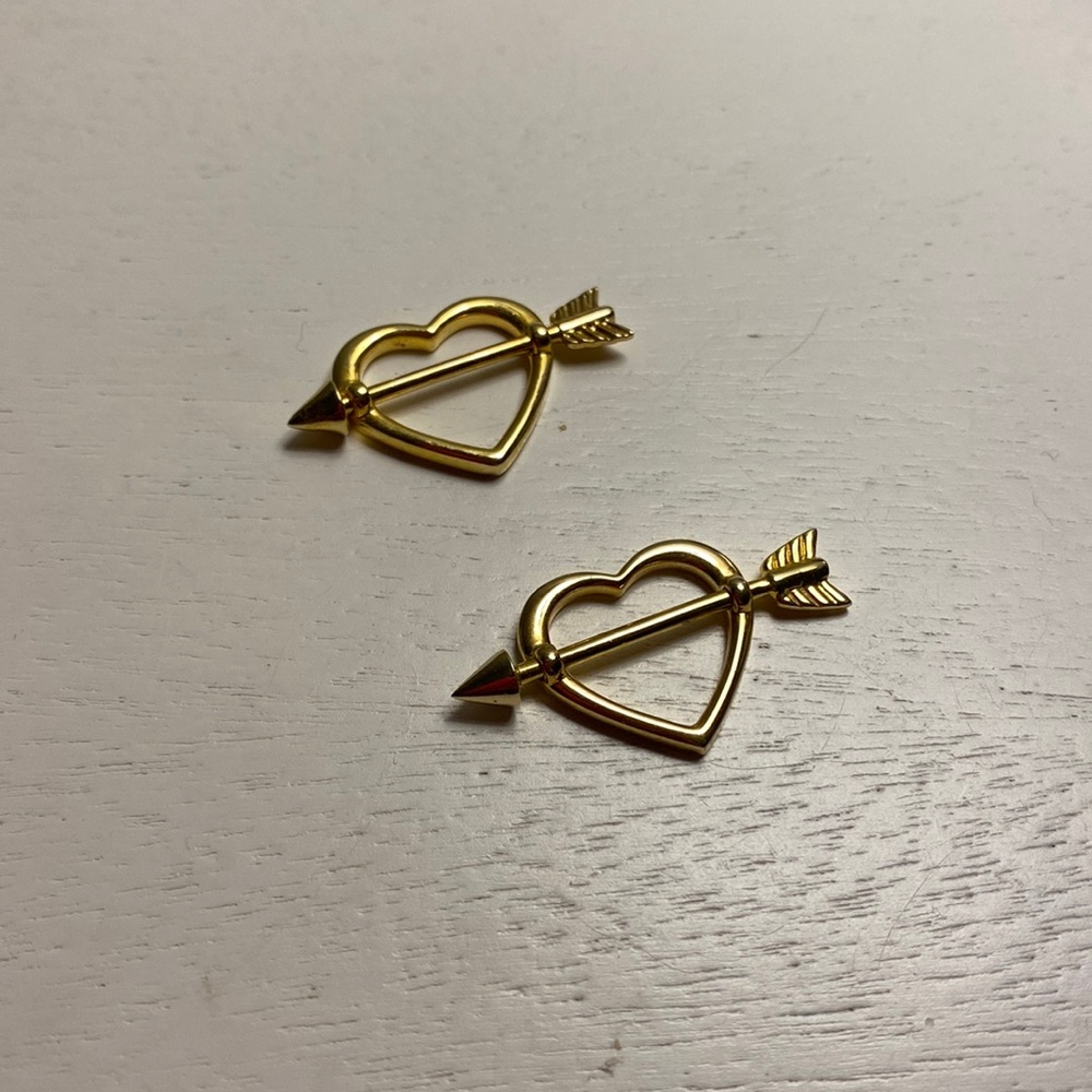 Gold heart nipple rings